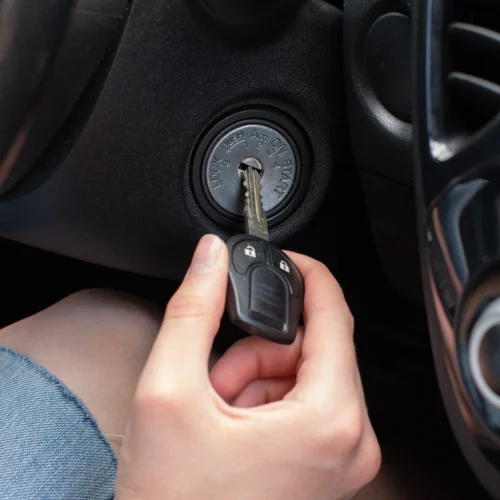 driver-s-hand-inserting-a-car-key-turn-on-the-ca-2026-01-08-06-21-36-utc-copy-scaled.webp