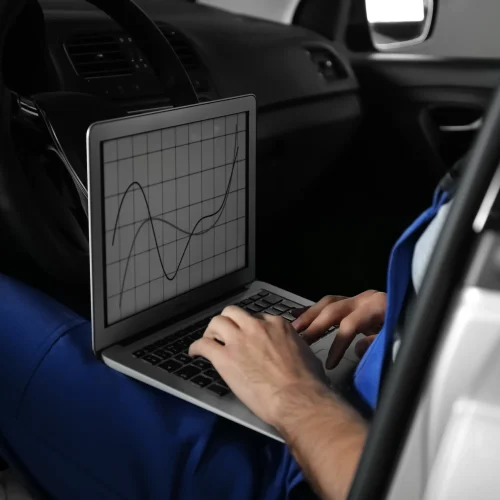 mechanic-with-laptop-doing-car-diagnostic-at-autom-2026-01-22-19-18-37-utc-copy-scaled.webp